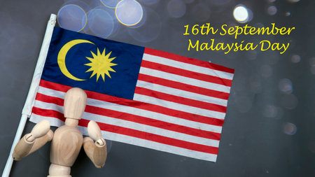All Malaysian celebrating independence day on 31st August and Malaysia day on 16th September each year. A celebration on Malaysia historical day. Selective focus on the Malaysia flag.の写真素材