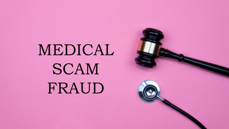 Selective focus on gavel and stethoscope. Medical fraud and scam concept. Life insurance fraudの写真素材