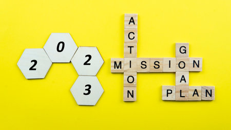 Selective focus of a tiles of word on a yellow background. Plan Action Goal Mission.の写真素材