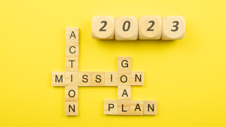 Selective focus of a tiles of word on a yellow background. Plan Action Goal Mission.の写真素材