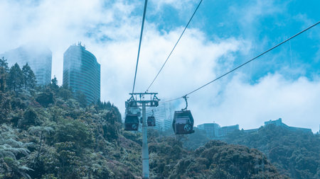 Pahang, Malaysia, 23rd July 2023 - Selective focus of view inside famous Genting Highlands cable car. Genting Highland cable car attract tourist from domestic and international due to the sceninc view,のeditorial素材