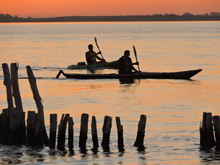 Kayaking at sunsetの写真素材
