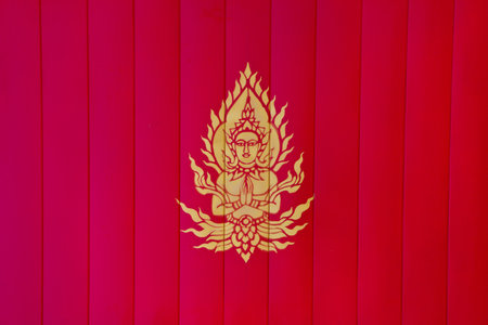 Figure of Thai angel painted on ceiling of the templeの写真素材