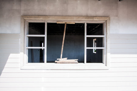 window in a house under construction の写真素材