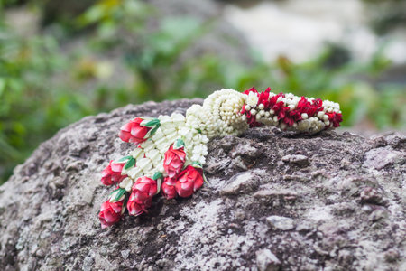 Malai The flower in Thai Tradition Style on rockの写真素材