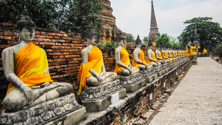 Ancient Buddha statues in Thailandの写真素材