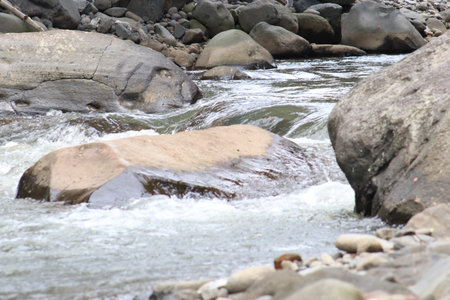 Water flow in rocky riverの写真素材
