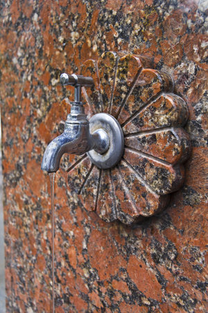 Tap with a mineral water  Pumproom in Yalta, Crimea at Chekhov streetの写真素材