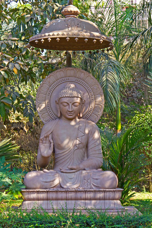 FEBRUARY 4, 2014, BHUBANESHWAR ORISSA, INDIA - Sculpture of Buddha in a city parkのeditorial素材