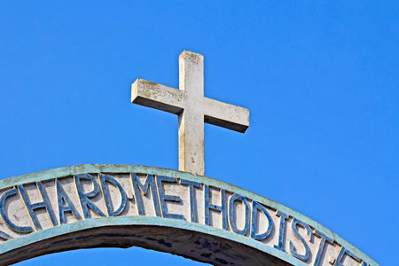 Christian cross at the entry to the christian methodist church in Vrindavanの写真素材
