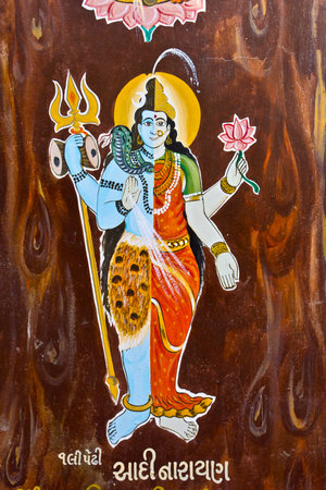 FEB 11, 2015,  DWARKA, INDIA - Image of Adrogynic god, Durga and Shiva as one body, on the wall of Hindu templeのeditorial素材