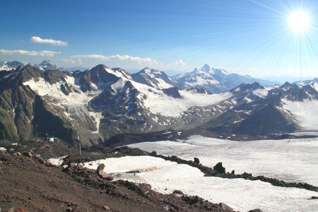 Panorama of mountain peaks in the sun, the majesty and beauty of the world, the Caucasusの写真素材