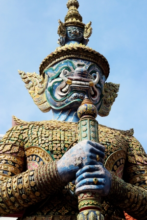  BANGKOK, THAILAND - December 14: Giant guardian at Temple on 14 December 2012 at ancient Buddhist Temple (Wat Pra Kaew) in the Royal Grand Palace, Bangkok ,Thailand.のeditorial素材