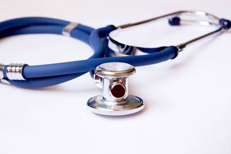  blue stethoscope on a white backgroundの写真素材