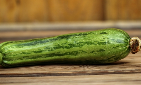 Â  plucked from the garden squash on the wooden tableの写真素材