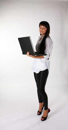 	young beautiful woman with notebook computerの写真素材