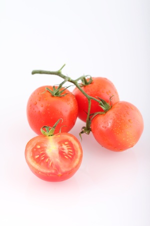 	Ripe Tomatoes on White Backgroundの写真素材