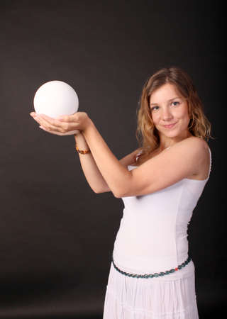 Portrait of Young Woman with the white ballの写真素材