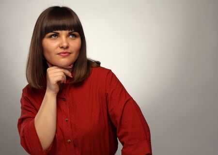 The pensive beautiful young girlの写真素材