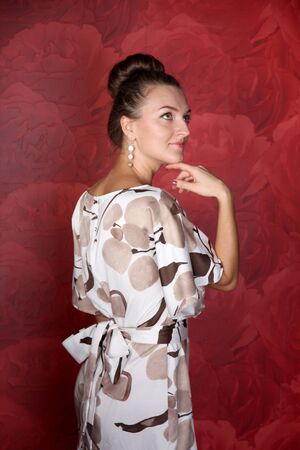 The dream woman on red rose backgroundの写真素材
