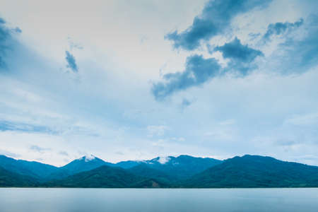 Mountains, clouds, mist, beautiful skies and water bodies in nature give a feeling of relaxation and refreshment.の写真素材