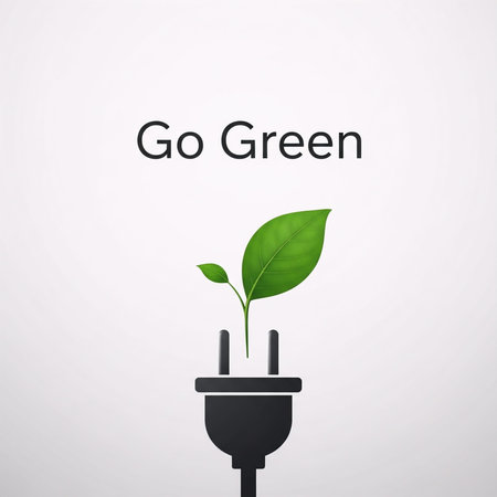 A green leaf grows out of an electrical plug with the words Go Green above it