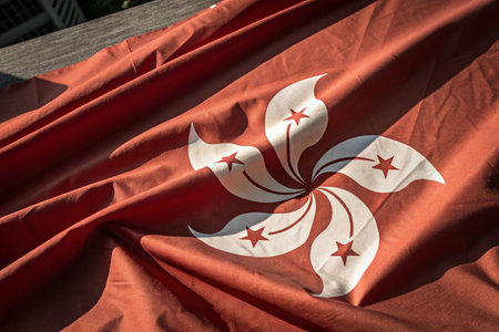 Flag of Hong Kong waving in the wind. Close-up.の写真素材