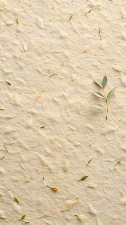 Cream cake with eucalyptus leaves, closeupの写真素材