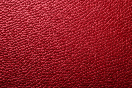 Red leather texture background for design with copy space for text or image.の写真素材