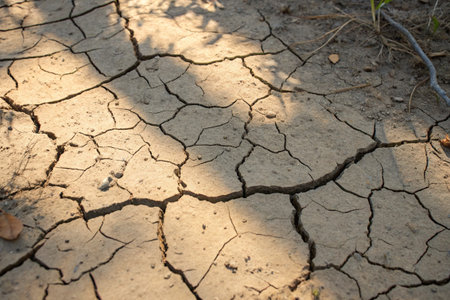 Dry and cracked earth background. Global warming, climate change.の写真素材