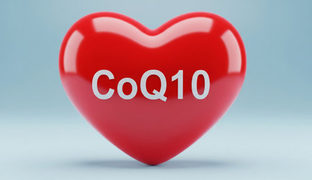 a shiny red heart with the text coq written on it in white letters on a light blue background in a studio shotの写真素材