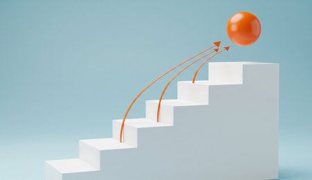 a visual representation of achieving goals, featuring an orange sphere at the top of white stairs with orange arrows.の写真素材