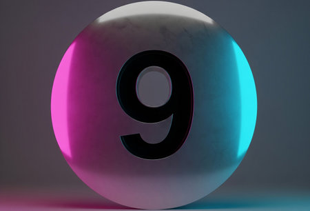 a reflective sphere with the number nine in black on the surface illuminatedの写真素材