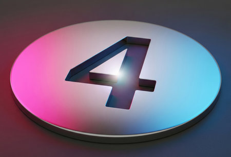 a metallic circular object with the number four cut out of it, close up shotの写真素材