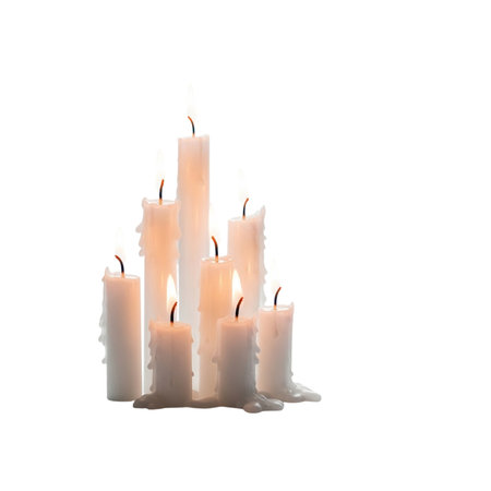 Group of white lit candles with dripping wax. Isolated on white background. Warm light ambiance. Glowing flames.の写真素材