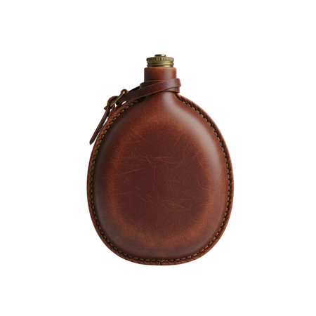 Vintage leather hip flask. Portable beverage container. Old fashioned drink bottle. Rustic travel accessory.の写真素材