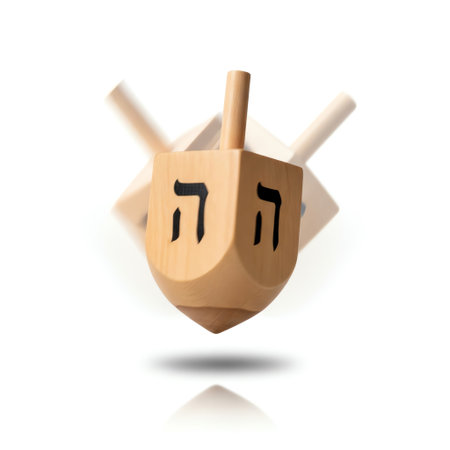 Wooden dreidel, spinning in motion, blurred background, traditional design, cultural significance, jewish holidayの写真素材