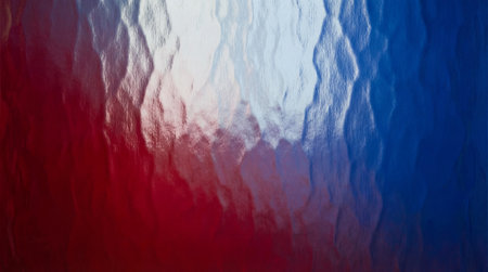 Stained glass texture background. Red white and blue patriotic color palette. Distorted light on hammered surface.の写真素材