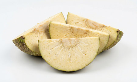 Artocarpus altilis wedges showing creamy pulp texture, tropical exotic food ingredient on white