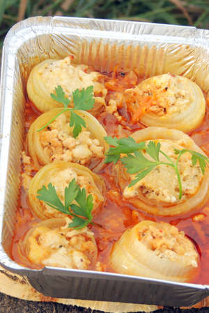 Onions stuffed with minced meat and baked in the Ovenの写真素材