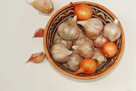 Garlic cloves and onionsの写真素材