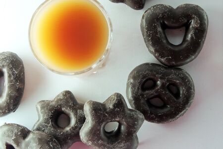 Orange juice and cookies on tablecloth .の写真素材