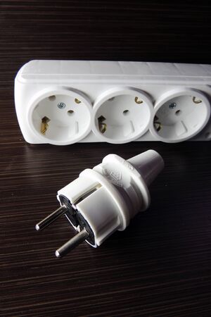 A power cord used conceptually on a white background