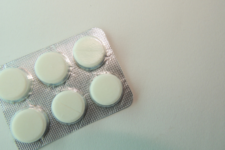 Medical pill tablet isolated on white, clipping path included