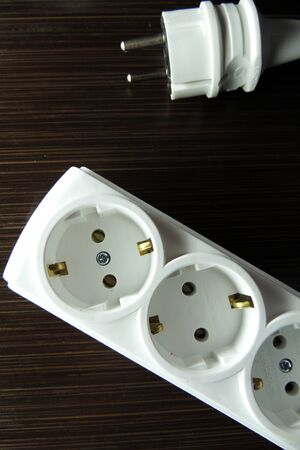 A power cord used conceptually on a white background