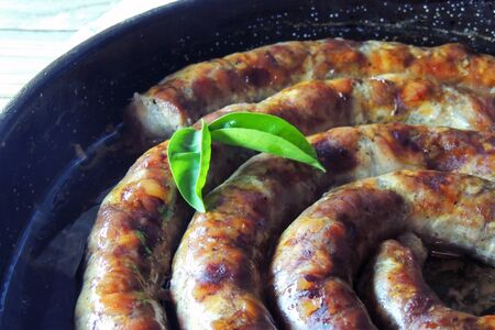Traditional baked polish sausage during the easterの写真素材
