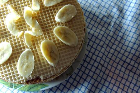 waffle cake with condensed milk and fruit.の写真素材