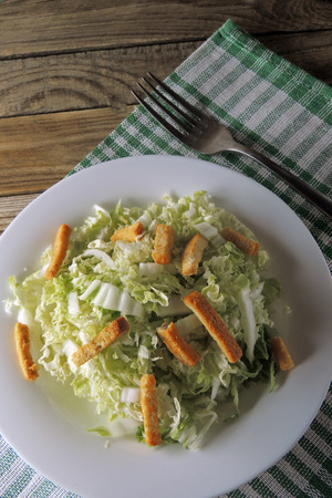 Dieticheskie Salad with Chinese cabbage on the plateの写真素材