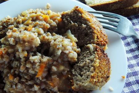 Russian Buckwheat porridge  vegetables und with chicken closeup