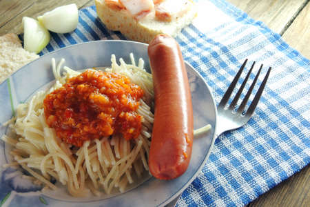 Pasta with sausage, bacon and bread. sauceの写真素材